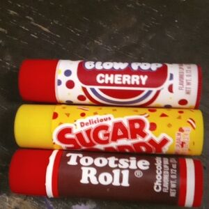 3 piece lip balm set , cherry blow pop, sugar daddy, tootise roll $6